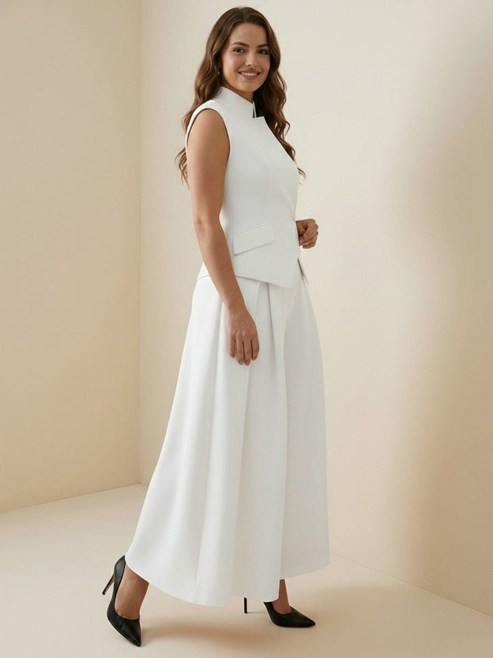 Pantalon ample plissé taille haute, à empiècements, couleur unie