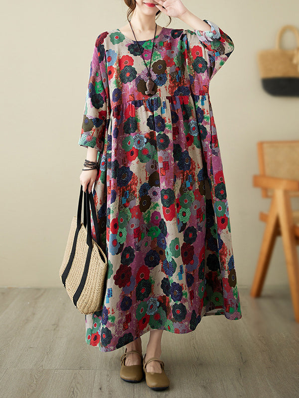 Robe mi-longue ample à manches longues, à imprimé floral, à poches, à empiècements, à col rond