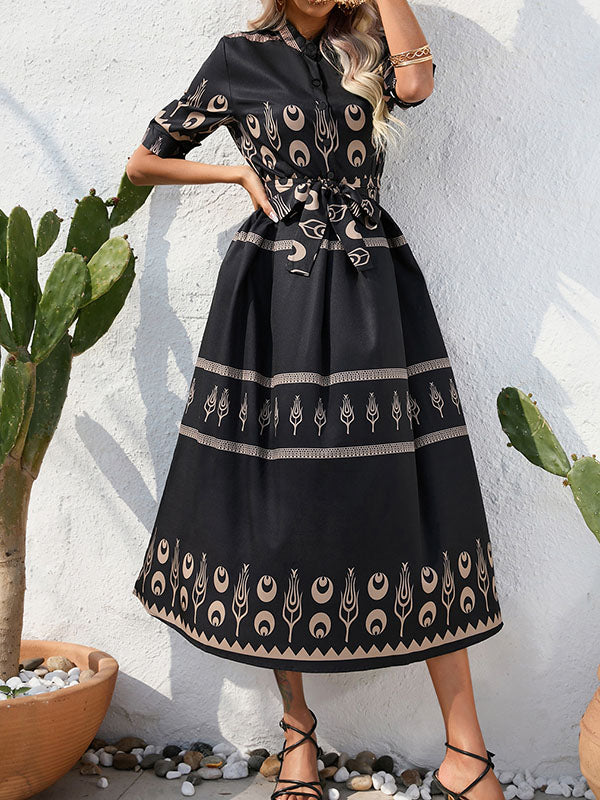 Robe mi-longue boutonnée coupe trapèze, à manches mi-longues, à taille nouée, à col revers