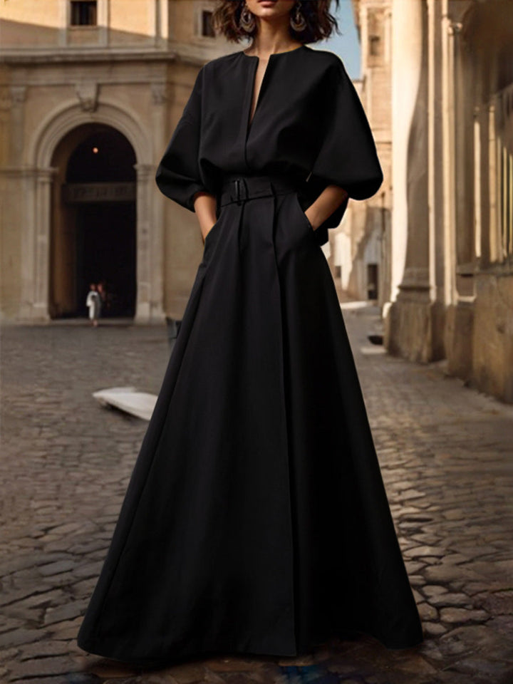 Robe longue ample à manches mi-longues, avec ceinture, à décolleté en V profond, couleur unie