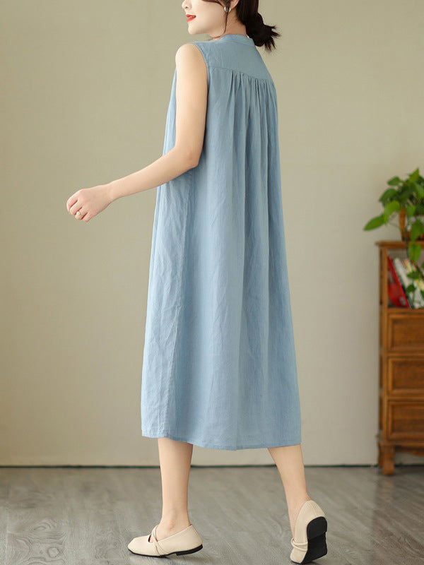 Robe mi-longue boutonnée plissée coupe trapèze, sans manches, à col rond, couleur unie