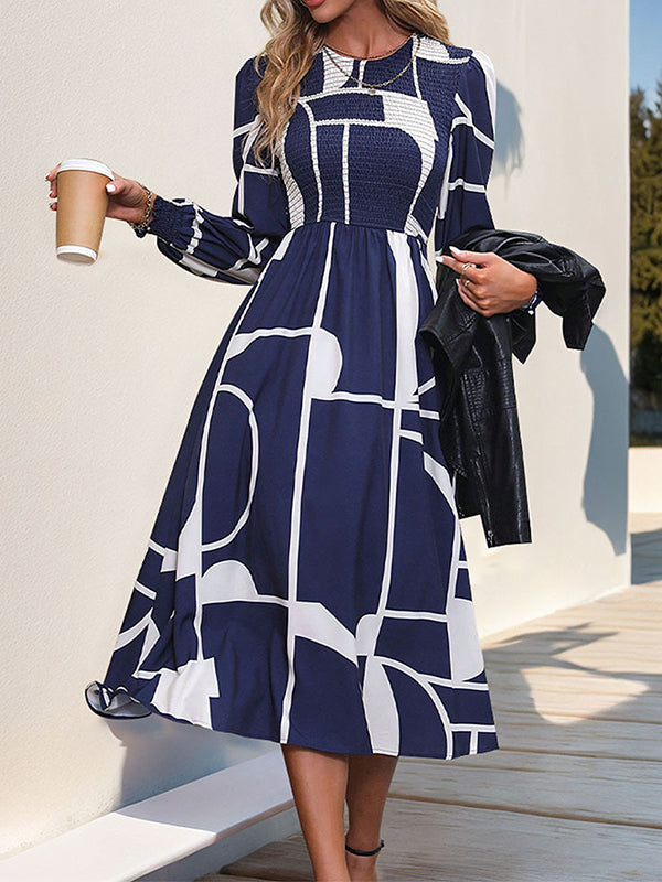 Robe mi-longue imprimée coupe trapèze, taille haute, à taille élastique, à empiècements, à col rond