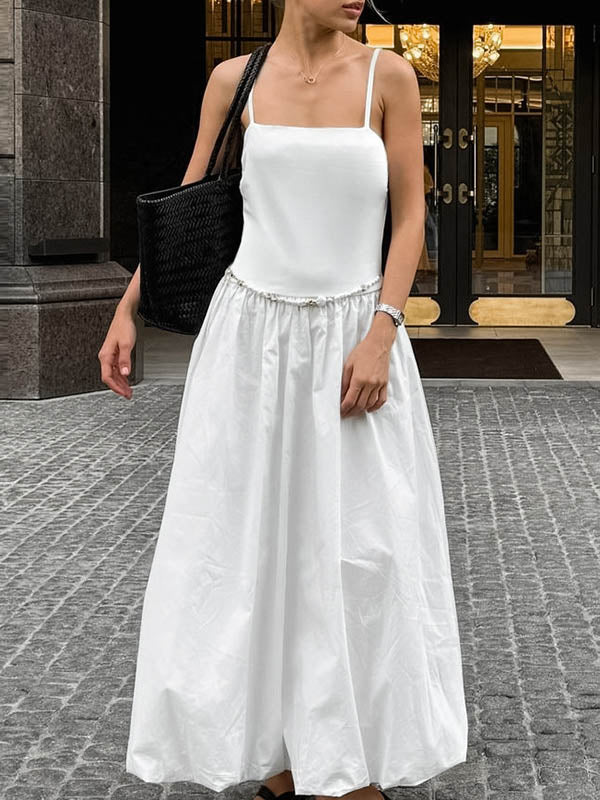 Robe mi-longue ample plissée sans manches, à empiècements, à fines bretelles, couleur unie