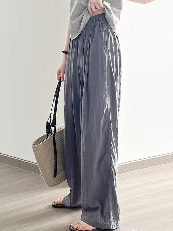 Pantalon ample plissé taille haute, à taille élastique, à poches, couleur unie