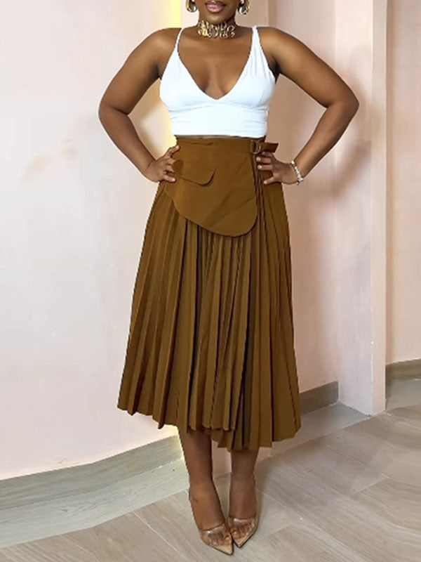 Jupe asymétrique plissée coupe trapèze, taille haute, à empiècements, couleur unie