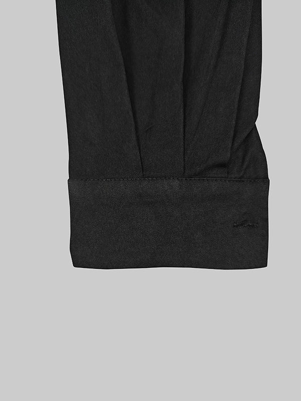 Combinaison ample boutonnée à manches longues, sans ceinture, à col en V, couleur unie