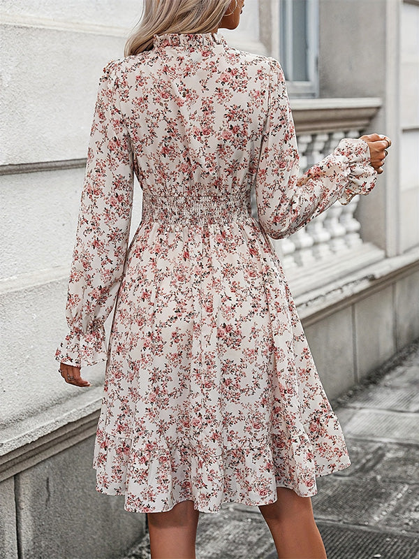 Robe mi-longue coupe trapèze, à manches longues, à taille élastique, à imprimé floral, à col en V