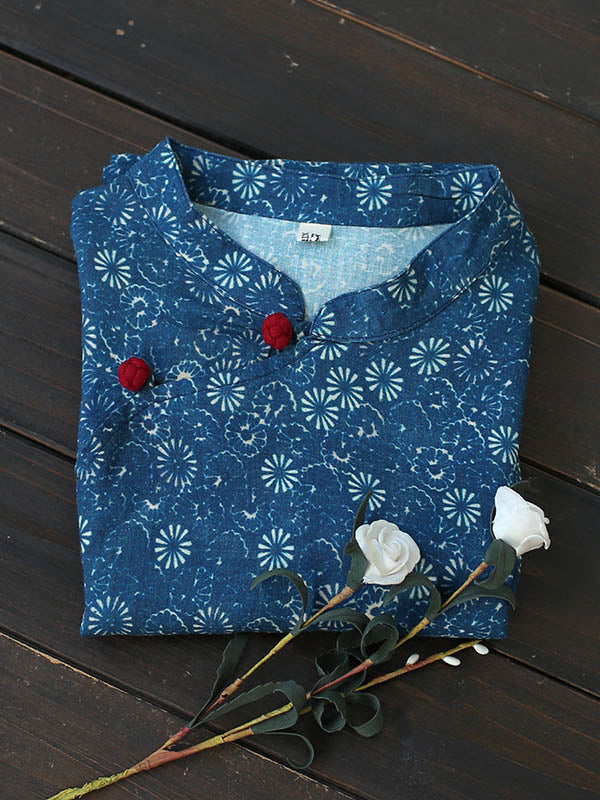 Robe mi-longue originale à col montant et motif floral uni