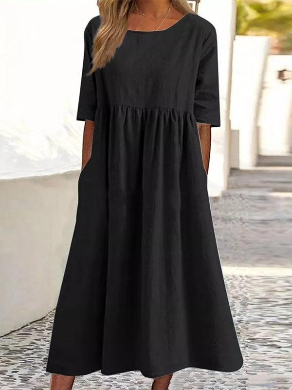 Robe mi-longue plissée coupe trapèze, à manches mi-longues, à poches, à col rond, couleur unie