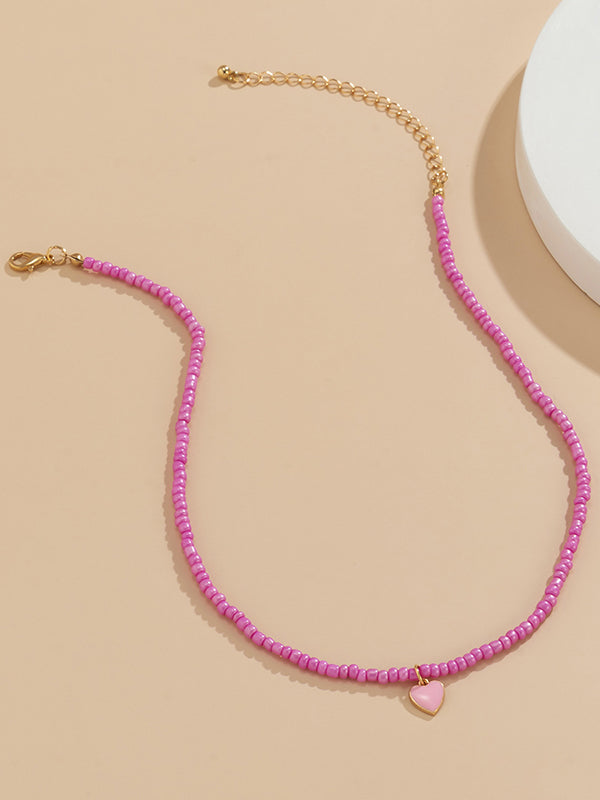 Collier à perles, couleur unie