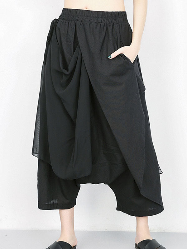 Pantalon 7/8 ample plissé couleur unie