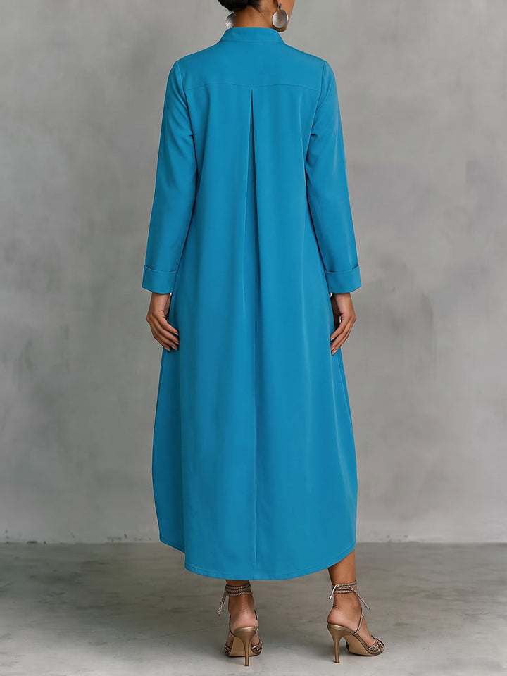 Robe mi-longue ample à poches, à manches longues, à col en V, couleur unie
