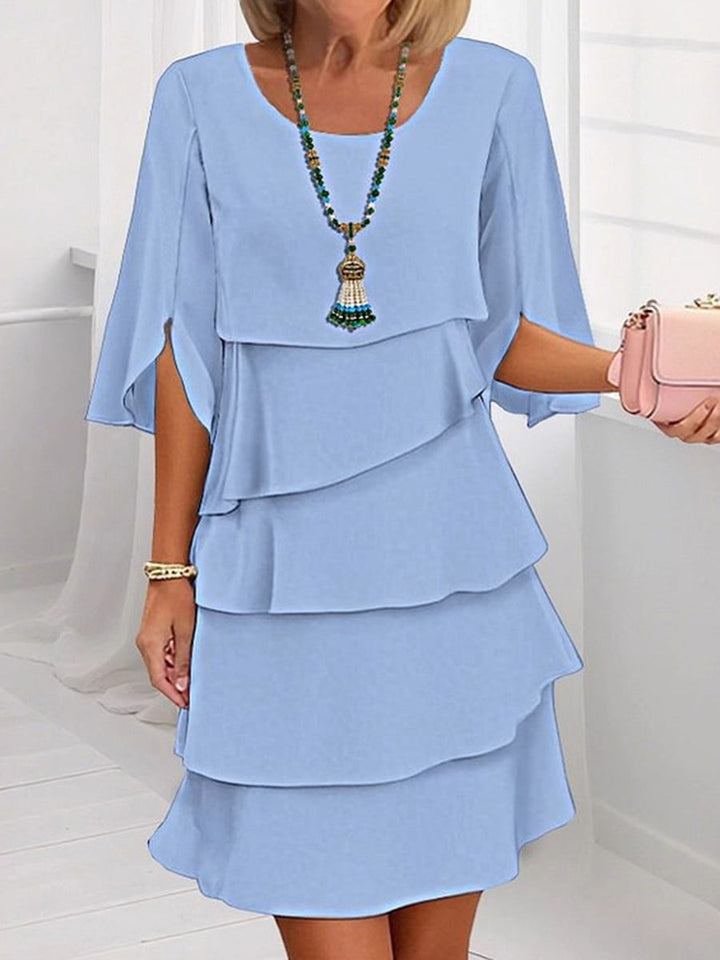 Robe courte ample superposée volantée à manches mi-longues, à empiècements, à col rond, couleur unie
