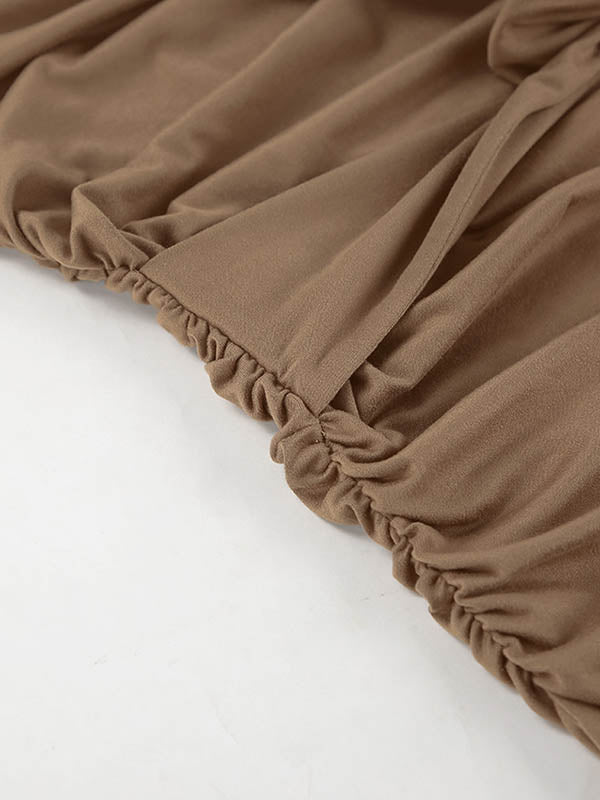 Robe courte moulante plissée coupe trapèze, à taille nouée, à fermeture éclair, à col rond, couleur unie