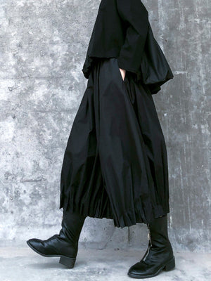 Pantalon élégant noir taille haute, à jambes larges, couleur unie