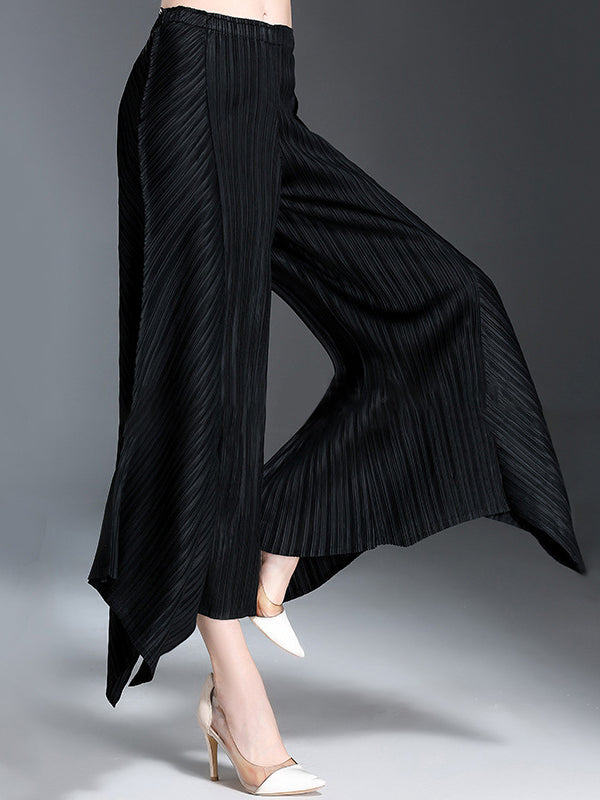 Pantalon ample original à jambes larges plissées irrégulières de couleur unie