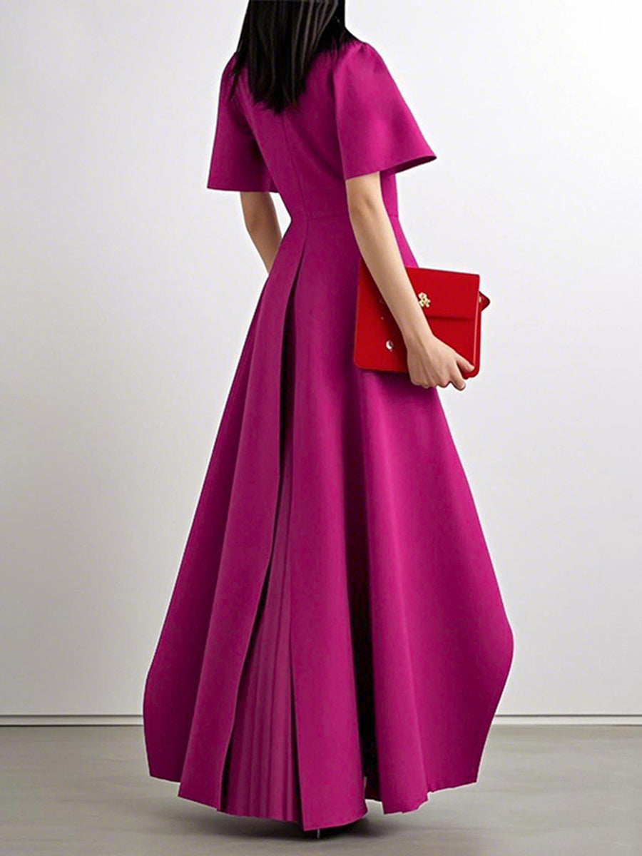 Robe longue plissée coupe trapèze, taille haute, à empiècements, à col rond, couleur unie