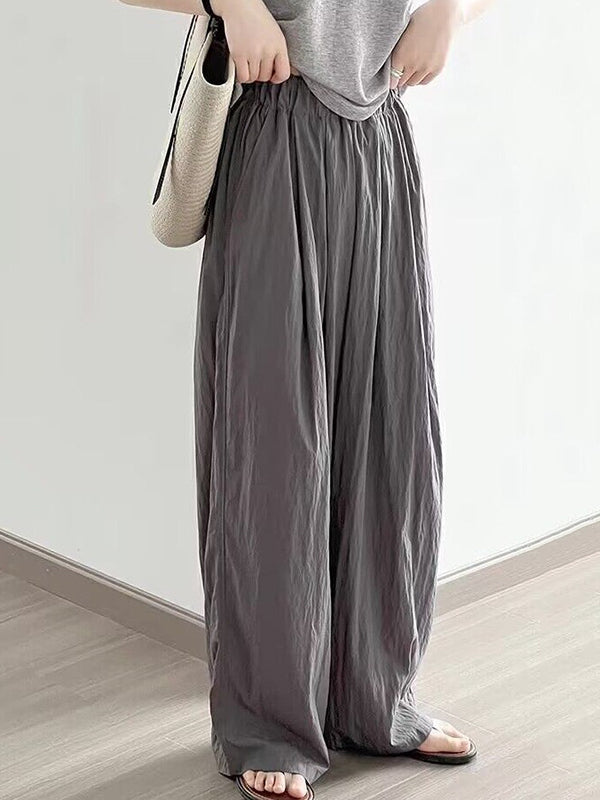 Pantalon ample plissé taille haute, à taille élastique, à poches, couleur unie