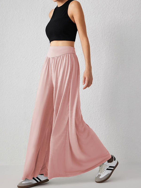 Pantalon ample plissé taille haute, à poches, à empiècements, couleur unie