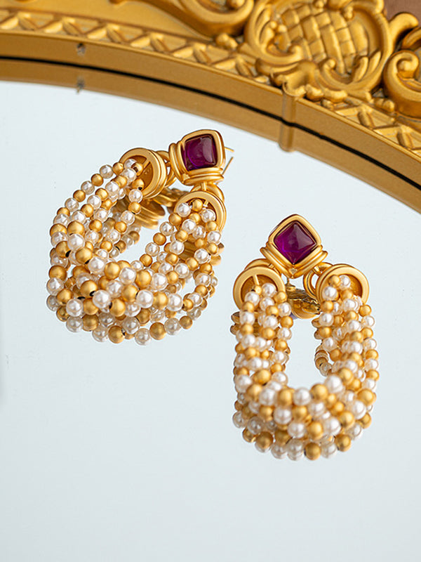 Boucles d'oreilles pendantes géométriques à pompons
