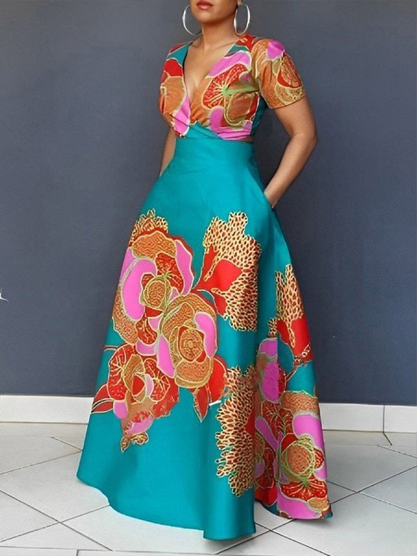 Robe de soirée longue ample coupe trapèze, à imprimé floral, à empiècements, à décolleté en V profond