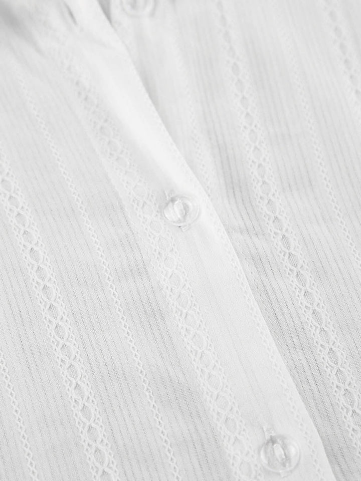 Chemisier ample boutonné rayé à manches longues, à empiècements, à col revers, couleur unie