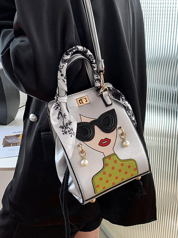 Sac à main imprimé à motifs figuratifs, à empiècements