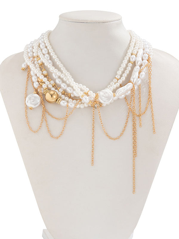 Collier géométrique superposé à pompons