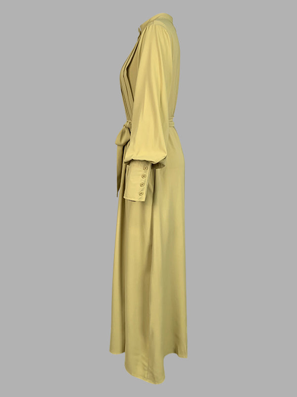 Robe longue boutonnée plissée coupe trapèze, à manches longues, à poches, à taille nouée, à col en V, couleur unie