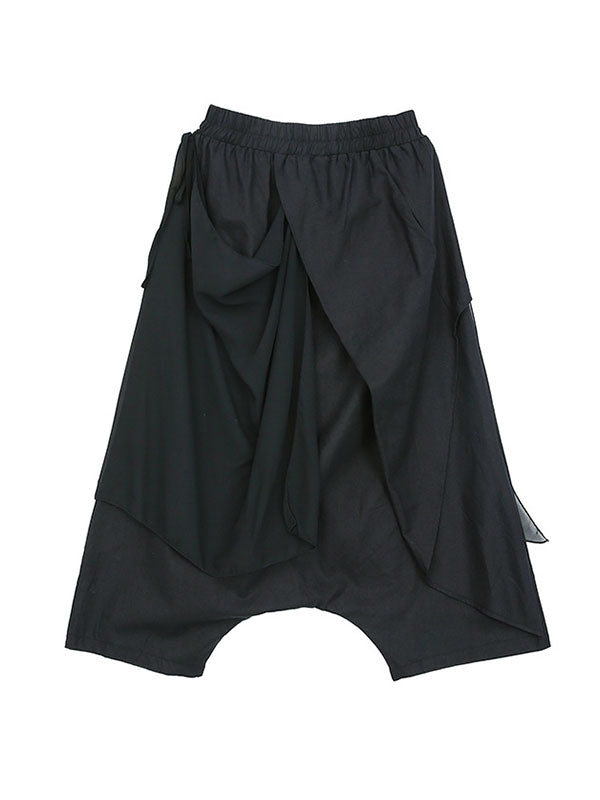 Pantalon 7/8 ample plissé couleur unie