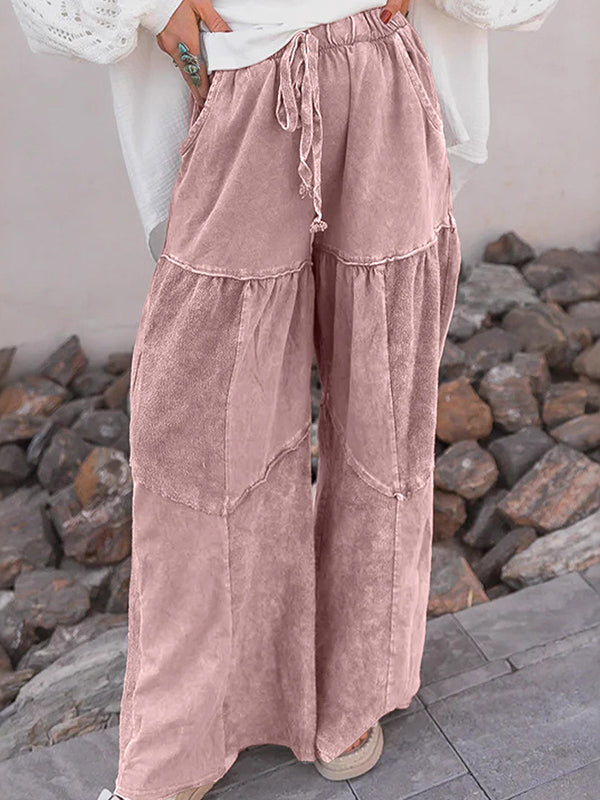 Pantalon ample plissé taille haute, à cordon de serrage, à poches, à empiècements, couleur unie