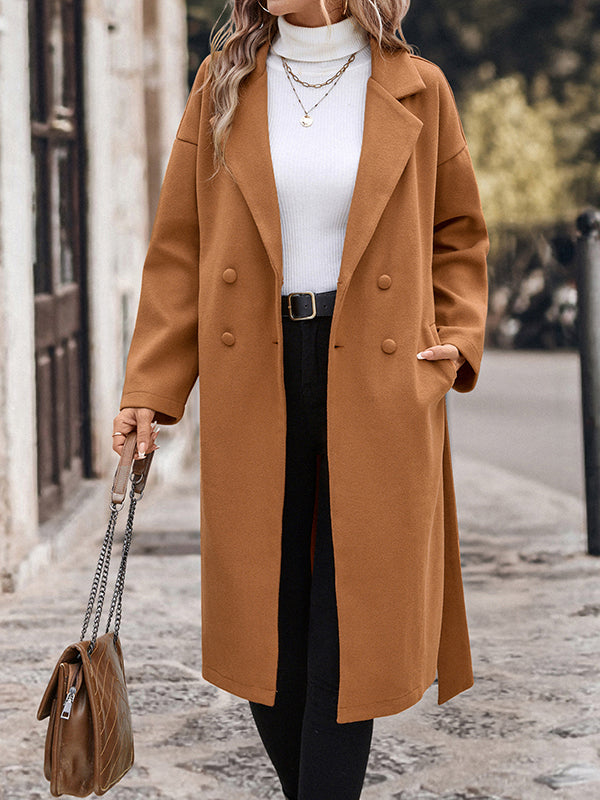 Manteau en laine ample boutonné à manches longues, à empiècements, à taille nouée, à col cranté, couleur unie