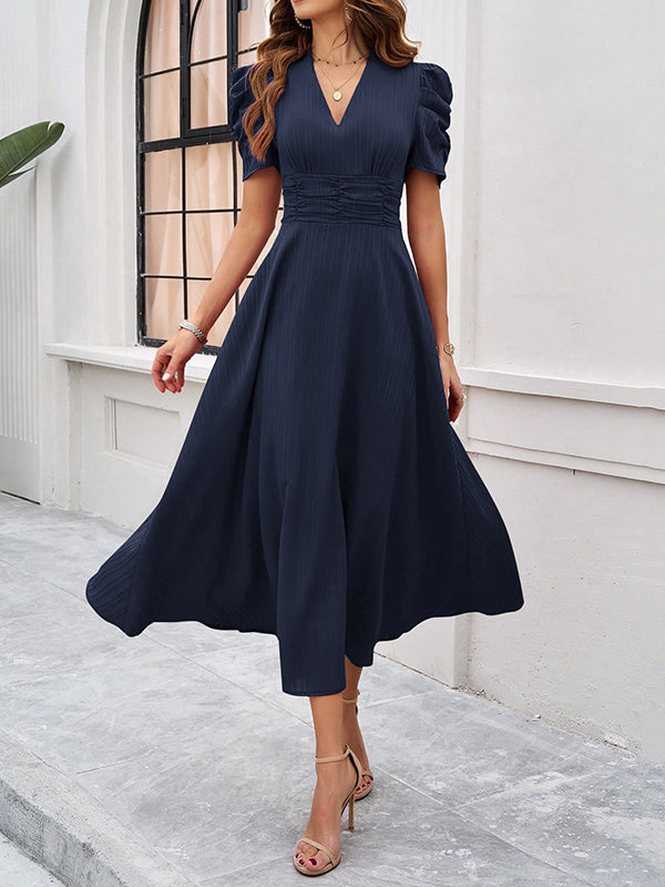 Robe longue plissée coupe trapèze, taille haute, à fermeture éclair, à col en V, couleur unie