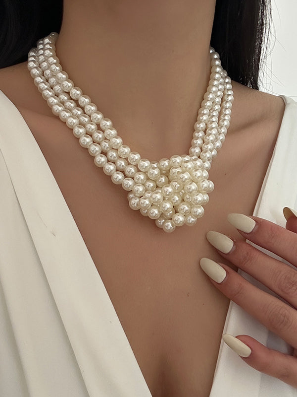 Collier perlé à empiècements