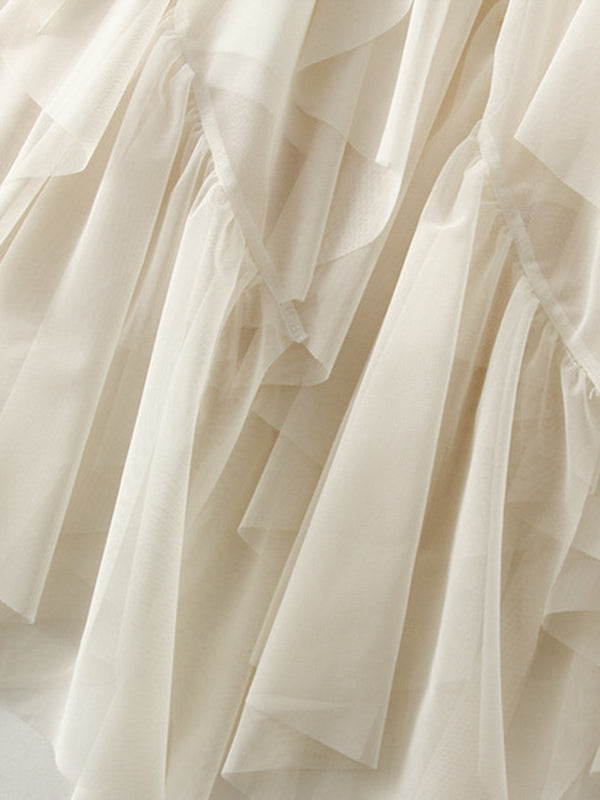 Jupe ample plissée coupe trapèze, à taille élastique, en gaze, à empiècements, couleur unie