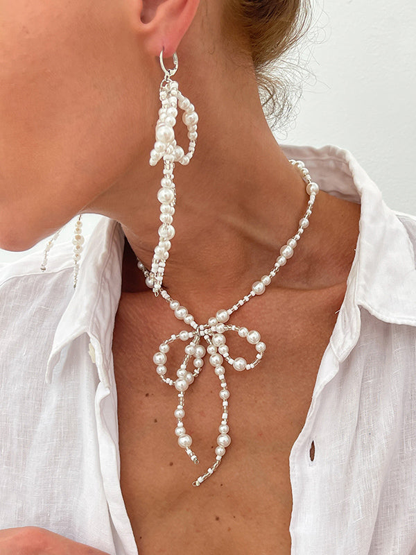 Parure boucles d'oreilles pendantes et collier à nœud