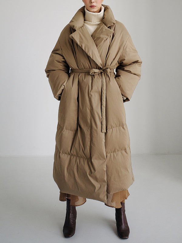 Manteau ample noué matelassé à manches longues, à col haut, couleur unie