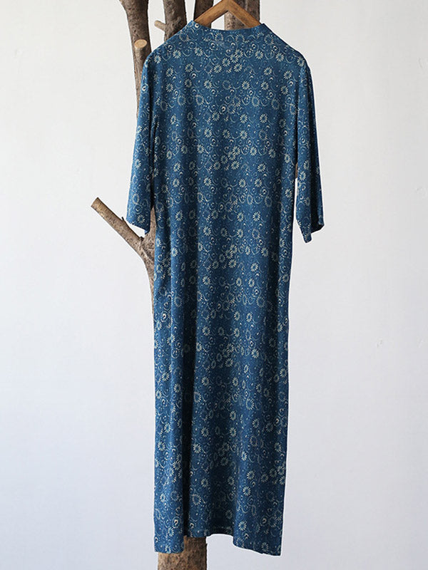 Robe mi-longue originale à col montant et motif floral uni