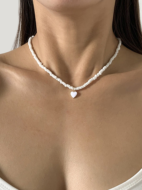 Collier à perles, couleur unie