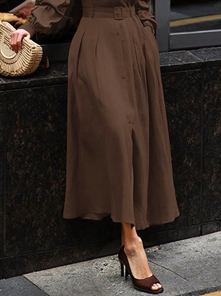 Robe chemise ample plissée à manches bouffantes, à empiècements, à col revers, couleur unie
