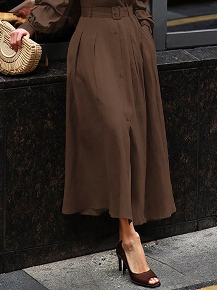 Robe chemise ample plissée à manches bouffantes, à empiècements, à col revers, couleur unie