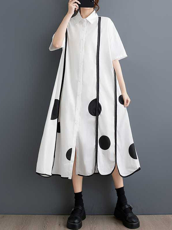 Robe chemise boutonnée fendue devant coupe trapèze, à manches mi-longues, à poches, à pois, à empiècements, à col revers