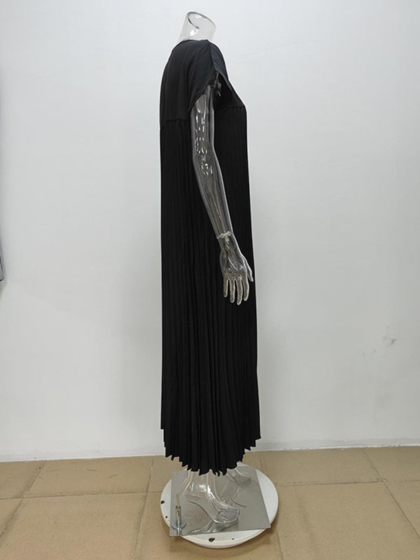 Robe longue plissée coupe trapèze, taille haute, à poches, à empiècements, à col rond, couleur unie