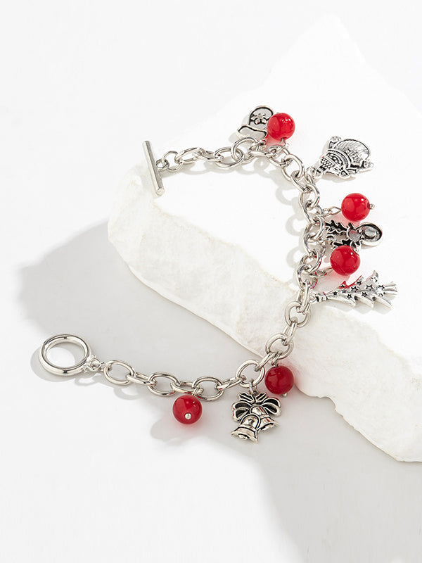 Bracelet géométrique à pompons