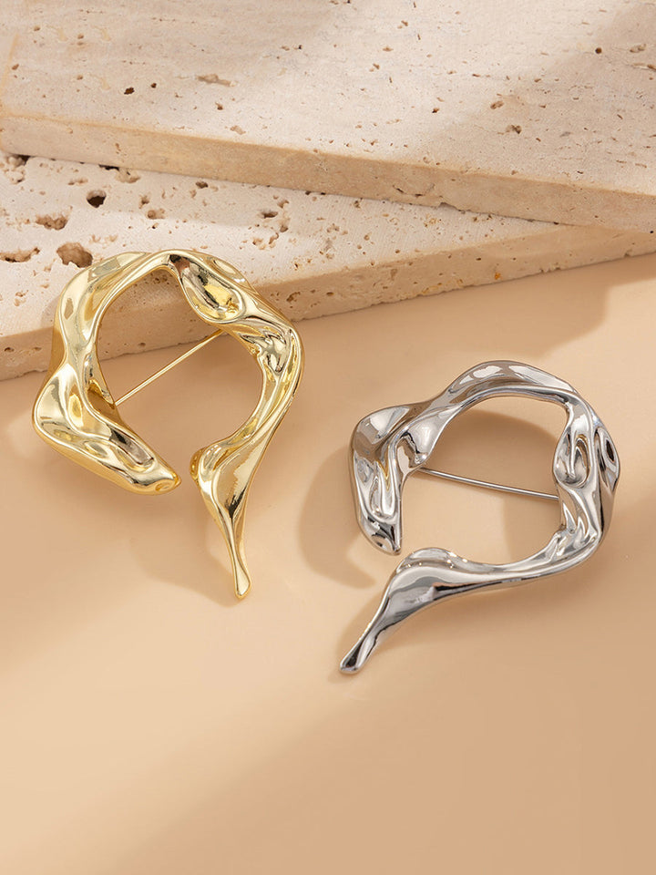 Broche à coupe irrégulière