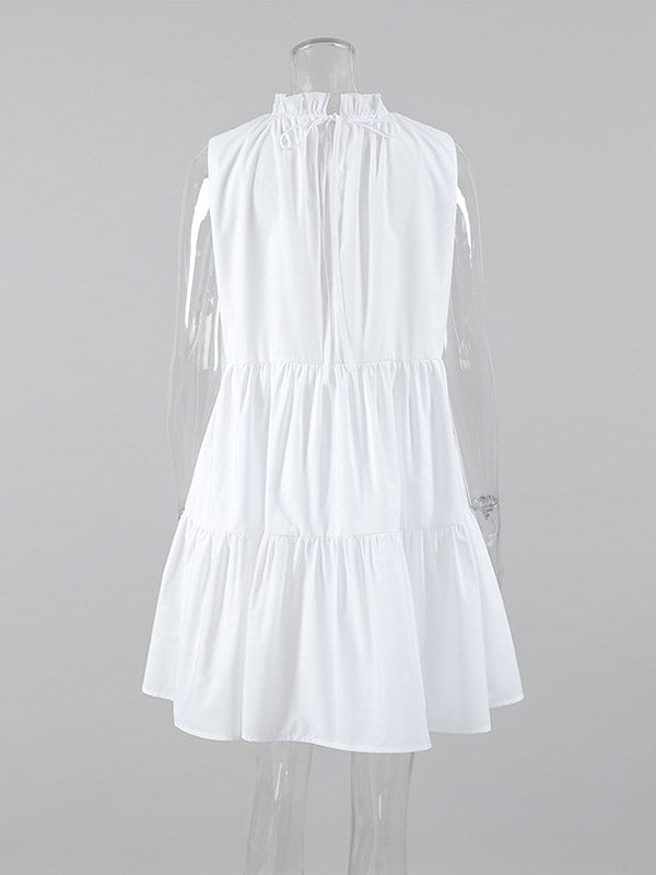 Robe chemise ample plissée volantée coupe trapèze, à empiècements, à col rond, couleur unie