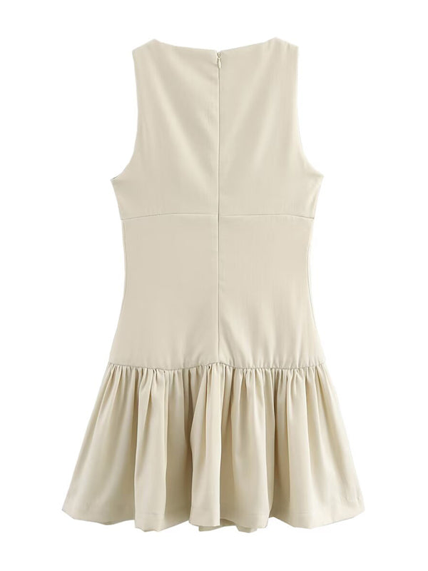 Robe courte ample plissée coupe trapèze, à empiècements, à fermeture éclair, à col rond, couleur unie