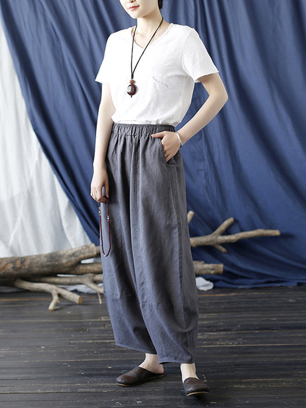 Pantalon large à taille élastique de couleur unie simple