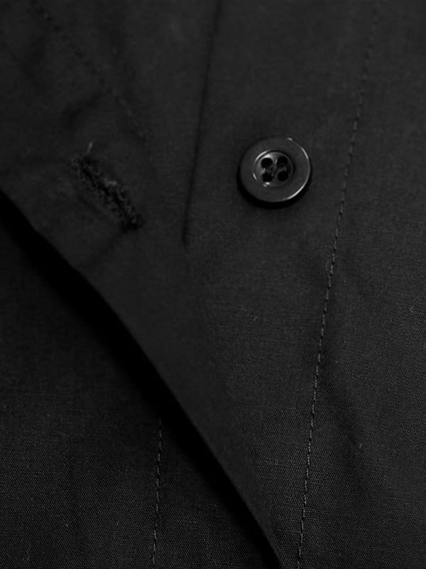 Chemisier ample boutonné à manches longues, à col revers, couleur unie