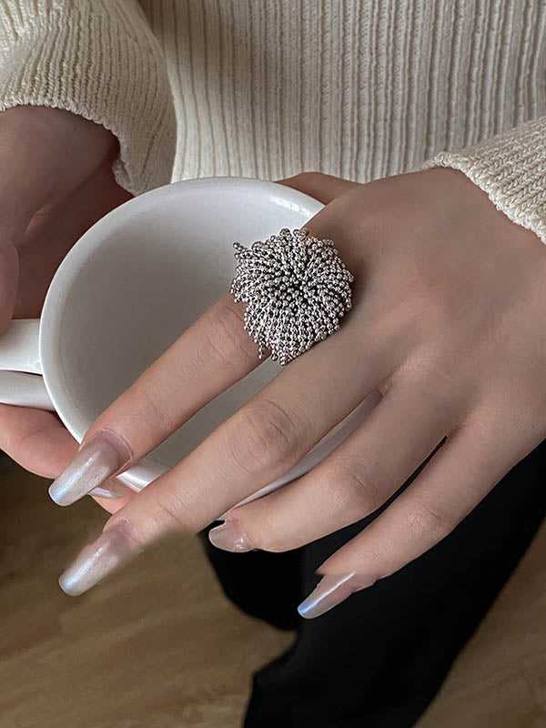 Bague géométrique à pompons